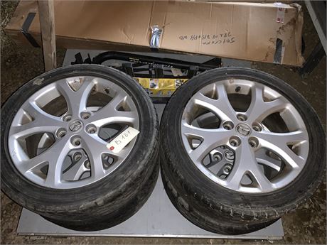 Lot 161 - 4 Mazda Wheels