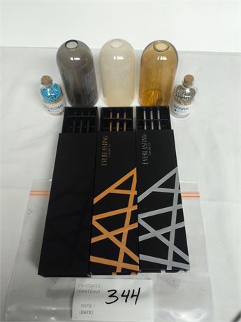 Lot 344 - Everlasting candle and Vase