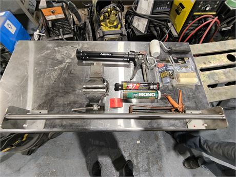 Lot 310 - Table Vise and accessories