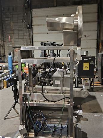 Lot 129 - Labbeling and capping machine