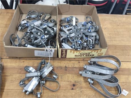 Lot 308 - Assorted sized conduit clamps